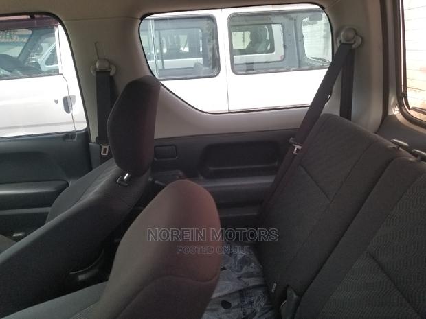 2014 Suzuki Jimny in White: Compact, Rugged, and Ready for Adventure