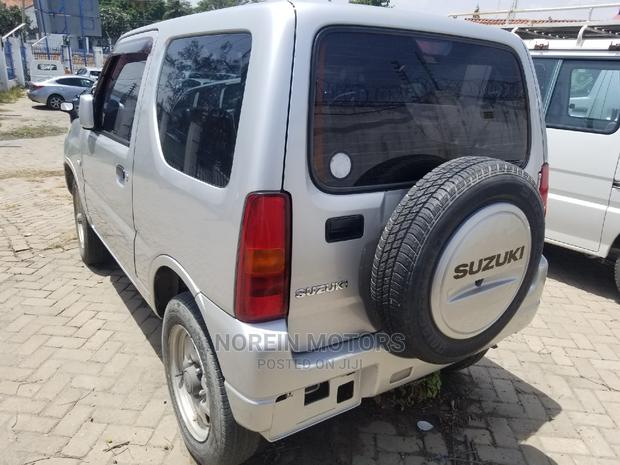2014 Suzuki Jimny in White: Compact, Rugged, and Ready for Adventure