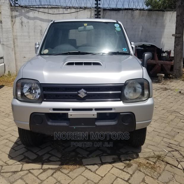 2014 Suzuki Jimny in White: Compact, Rugged, and Ready for Adventure