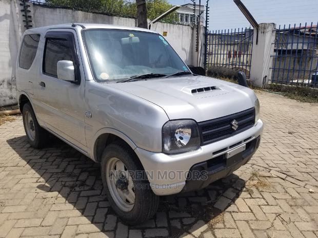 2014 Suzuki Jimny in White: Compact, Rugged, and Ready for Adventure