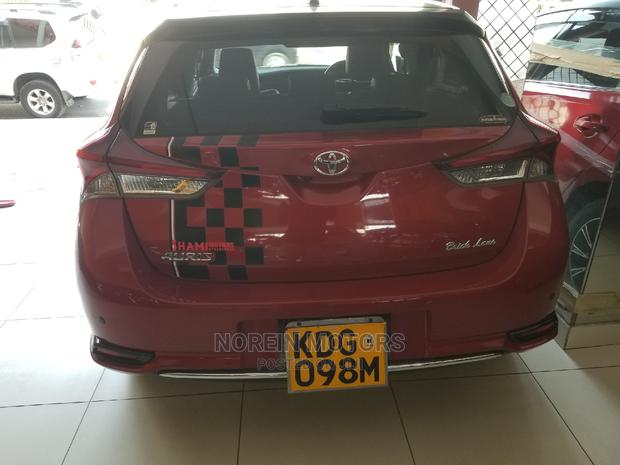 Red 2014 Toyota Auris: Quality Compact Car for a Great Price