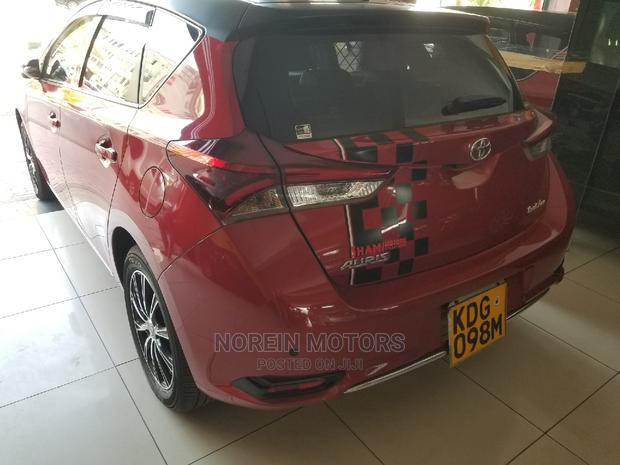 Red 2014 Toyota Auris: Quality Compact Car for a Great Price