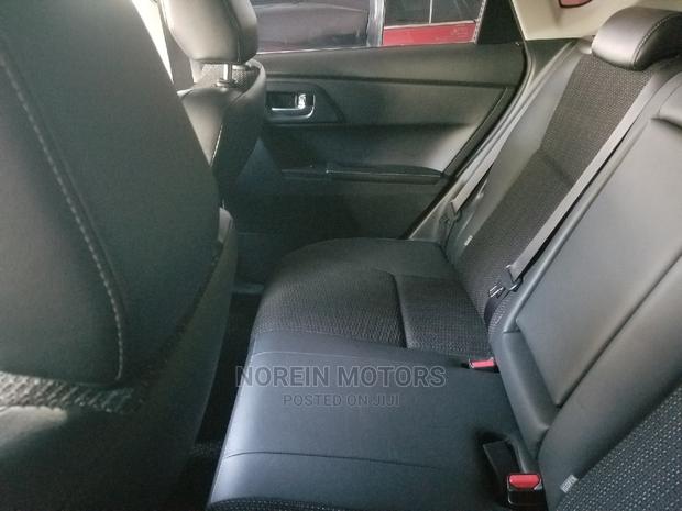 Red 2014 Toyota Auris: Quality Compact Car for a Great Price