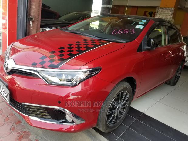 Red 2014 Toyota Auris: Quality Compact Car for a Great Price
