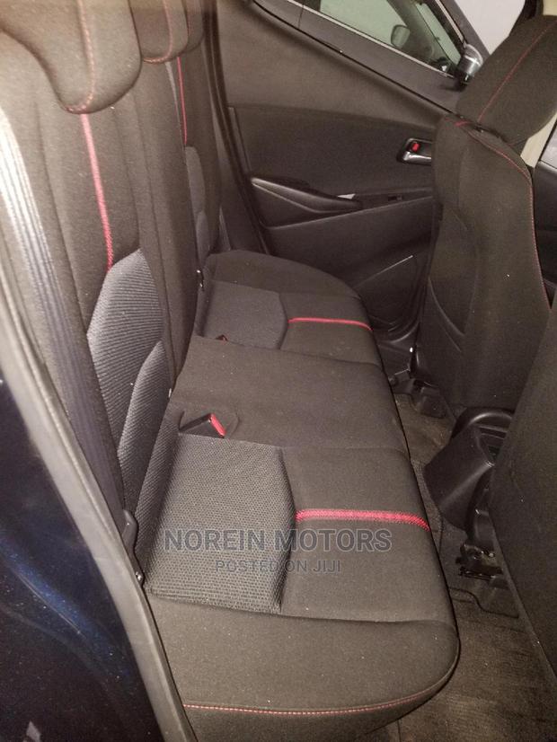 Ivory Mazda Demio 2014 - Compact Car, Big on Features and Style