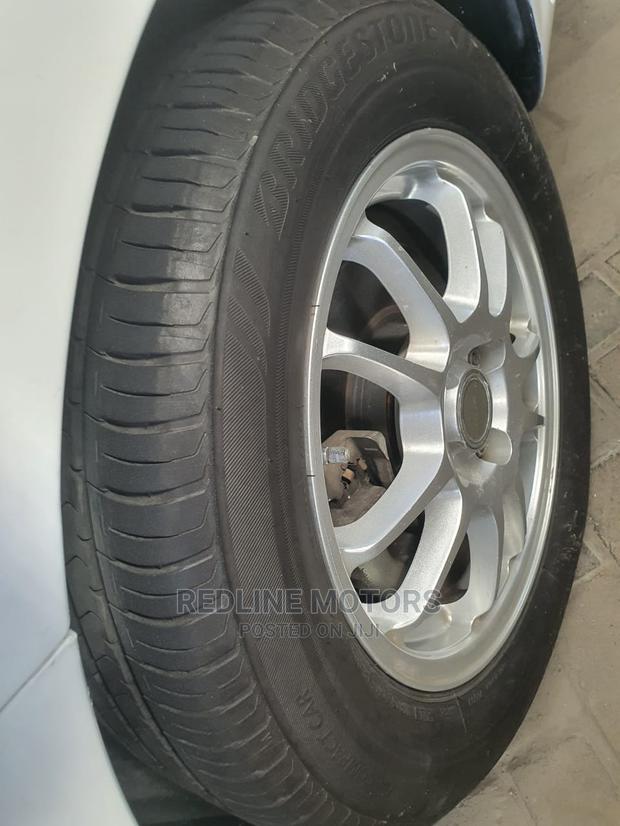 Pearl 2016 Toyota Fielder: Quality Pre-Owned Sedan