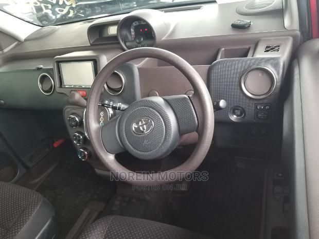 Red 2015 Toyota Spade: Compact SUV for the Modern Family