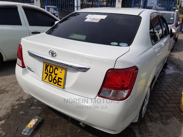 White 2015 Toyota Axio: Perfect Compact Sedan for Everyday Commute!