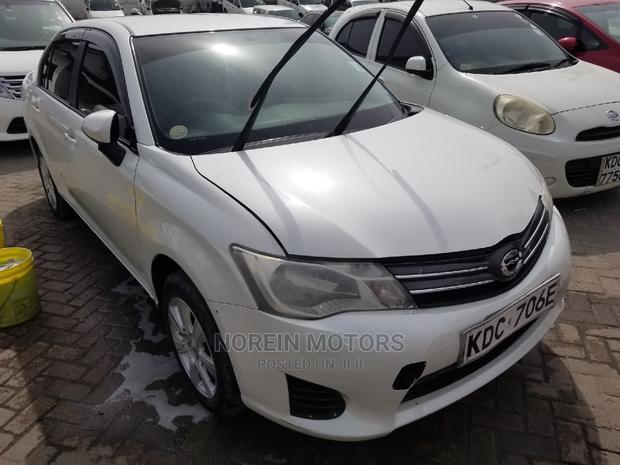 White 2015 Toyota Axio: Perfect Compact Sedan for Everyday Commute!
