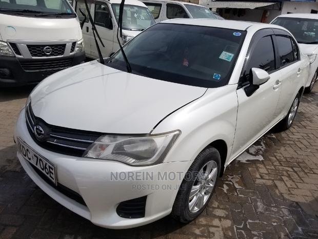 White 2015 Toyota Axio: Perfect Compact Sedan for Everyday Commute!