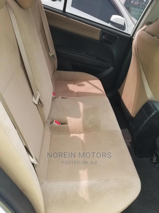 White 2015 Toyota Axio: Perfect Compact Sedan for Everyday Commute!