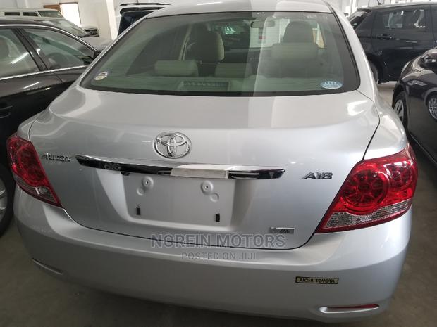Toyota's 2014 Allion in Green: Compact, Eco-Conscious Sedan