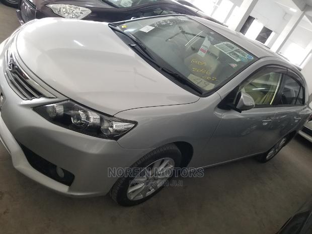 Toyota's 2014 Allion in Green: Compact, Eco-Conscious Sedan