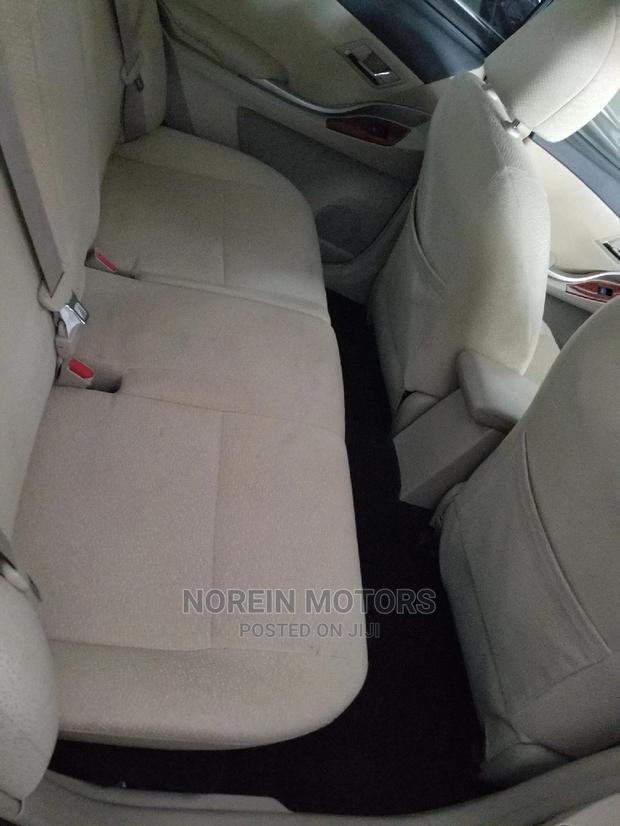 Toyota's 2014 Allion in Green: Compact, Eco-Conscious Sedan