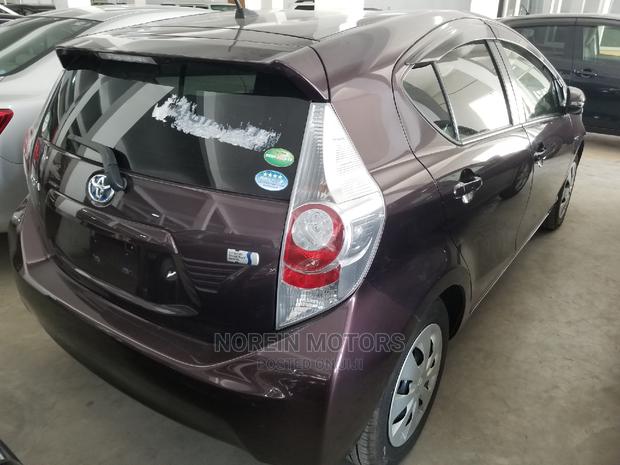Purple 2014 Toyota Aqua: The Perfect Blend of Style and Efficiency
