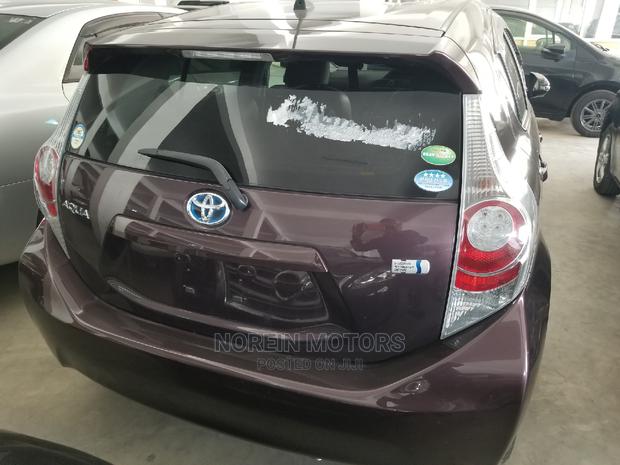 Purple 2014 Toyota Aqua: The Perfect Blend of Style and Efficiency