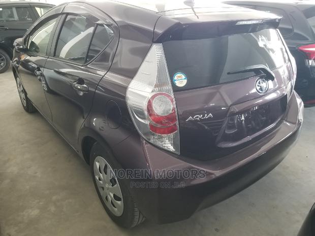Purple 2014 Toyota Aqua: The Perfect Blend of Style and Efficiency