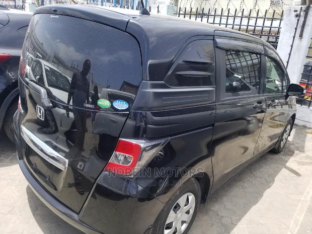 Honda Shuttle 2015 Black - Modern and Economical Transport Solution