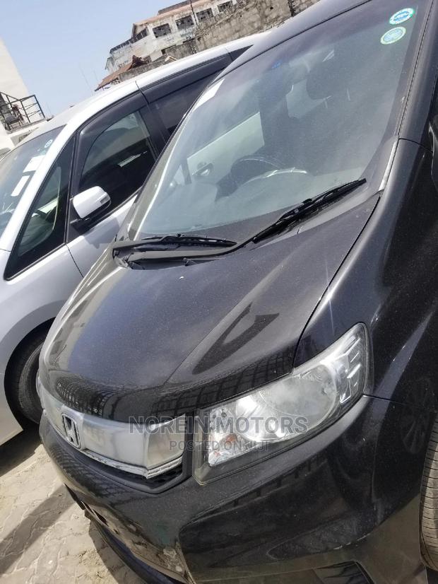Honda Shuttle 2015 Black - Modern and Economical Transport Solution