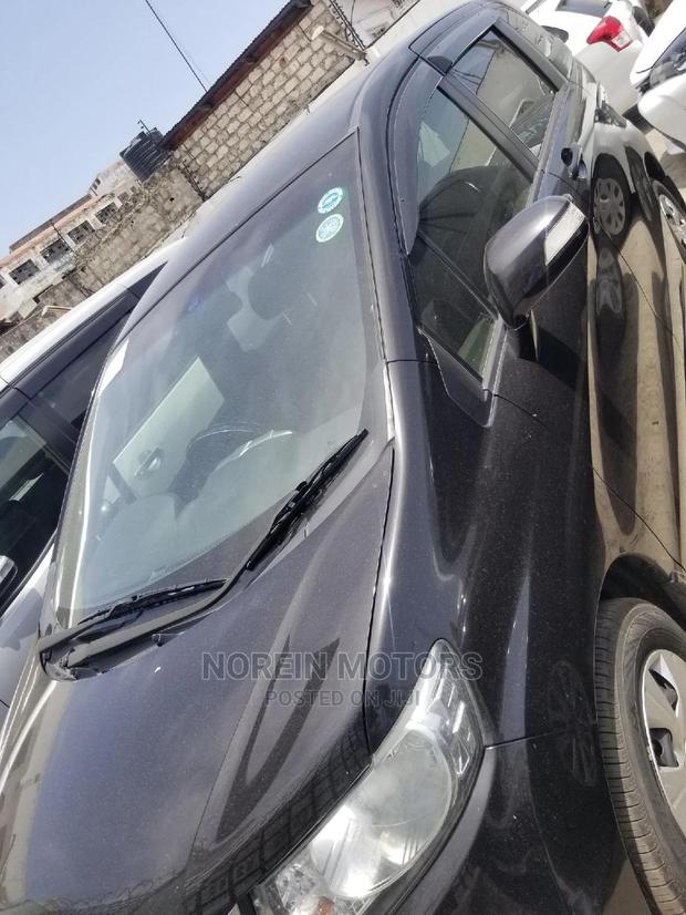 Honda Shuttle 2015 Black - Modern and Economical Transport Solution