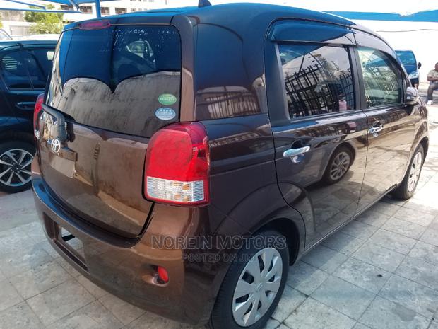 2015 Toyota Spade Orange: Affordable, Stylish, and Reliable!