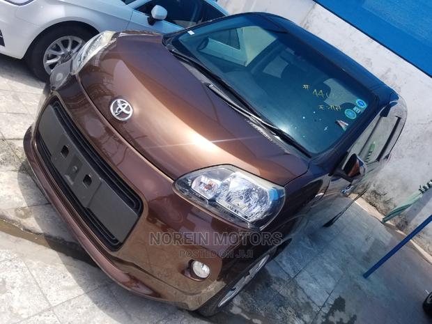 2015 Toyota Spade Orange: Affordable, Stylish, and Reliable!