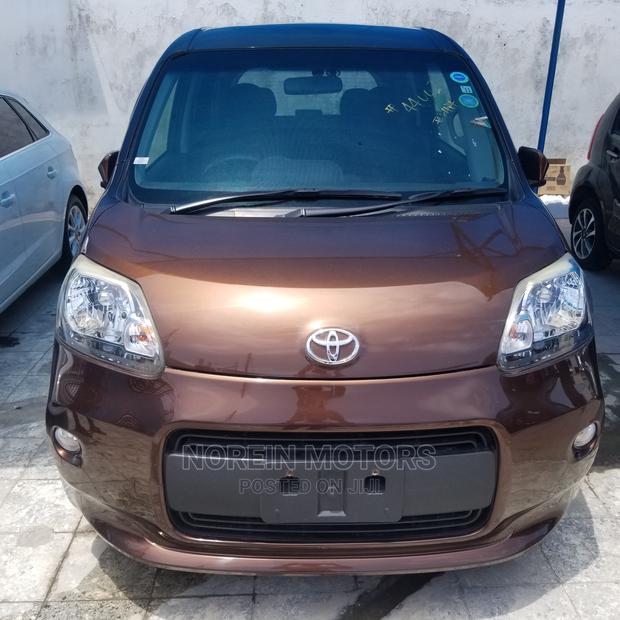 2015 Toyota Spade Orange: Affordable, Stylish, and Reliable!