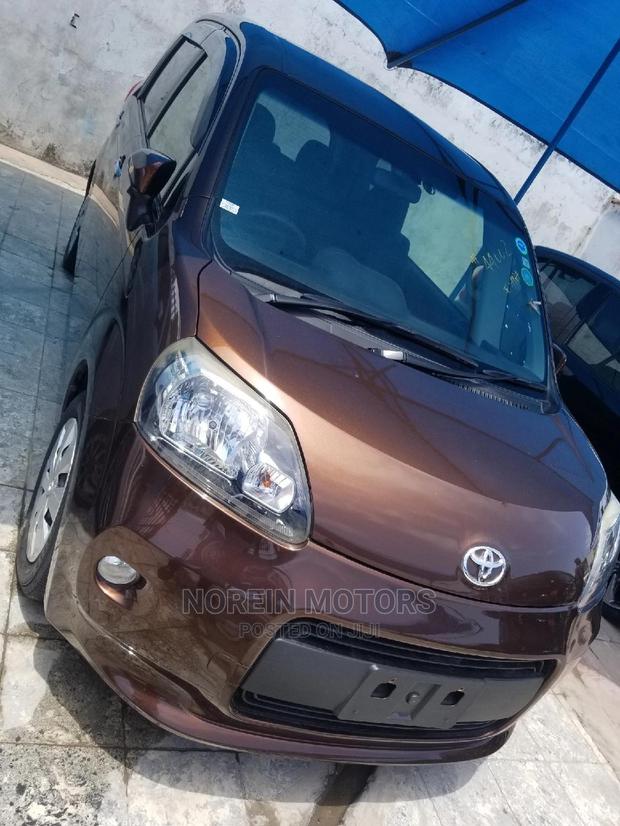 2015 Toyota Spade Orange: Affordable, Stylish, and Reliable!