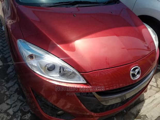 2014 Mazda Premacy Red: Versatile Minivan at a Great Price