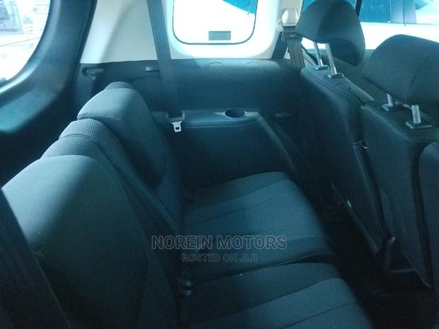 2014 Mazda Premacy Red: Versatile Minivan at a Great Price