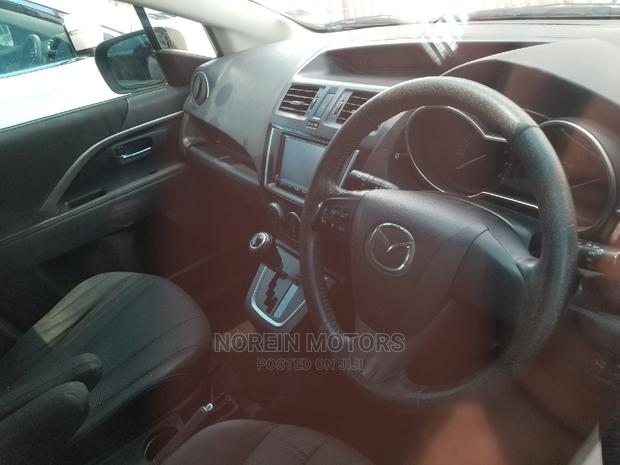 2014 Mazda Premacy Red: Versatile Minivan at a Great Price