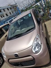 Pink Mazda Carol 2015: A Stylish Compact Choice for sale