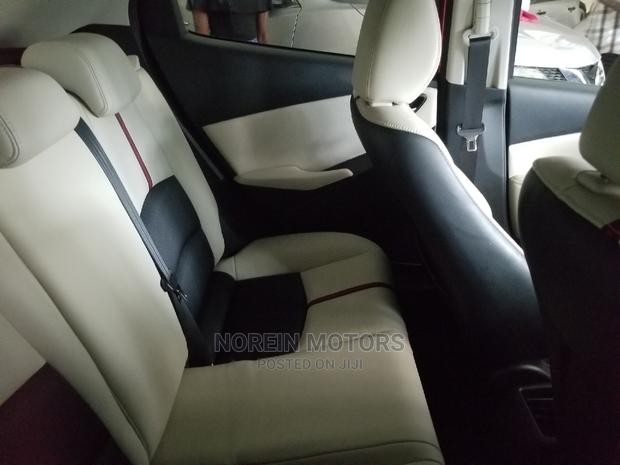 Red Mazda Demio 2014: Compact Car with Great Performance