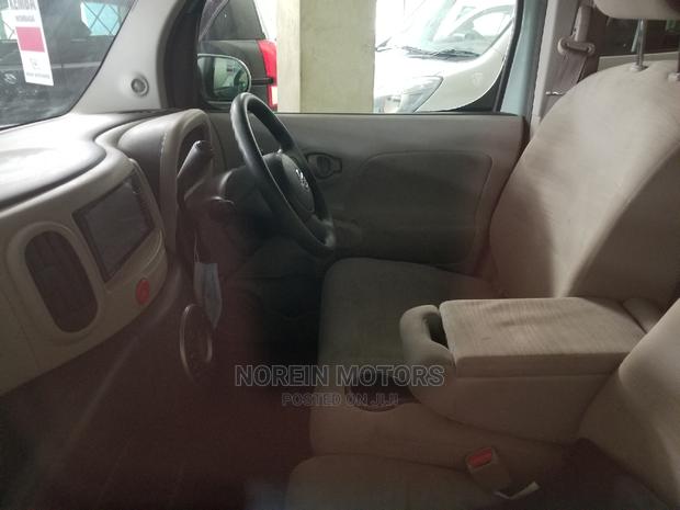 Red Mazda Demio 2014: Compact Car with Great Performance