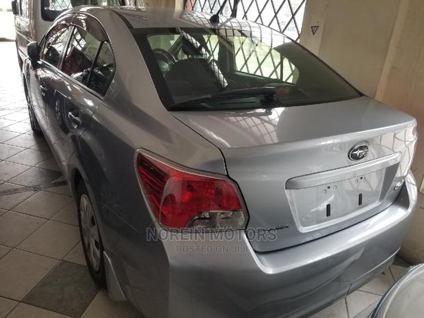 Pre-owned 2015 Subaru Impreza in Silver - Luxury Sedan