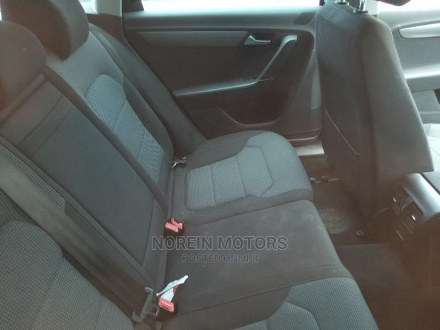 New 2014 Passat in Black: Stylish and Powerful Volkswagen Sedan