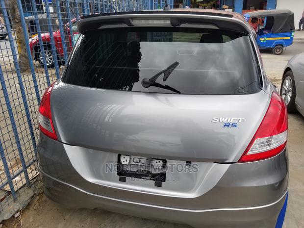 Silver 2014 Suzuki Swift - Compact Car Excellence