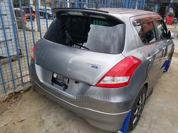 Silver 2014 Suzuki Swift - Compact Car Excellence