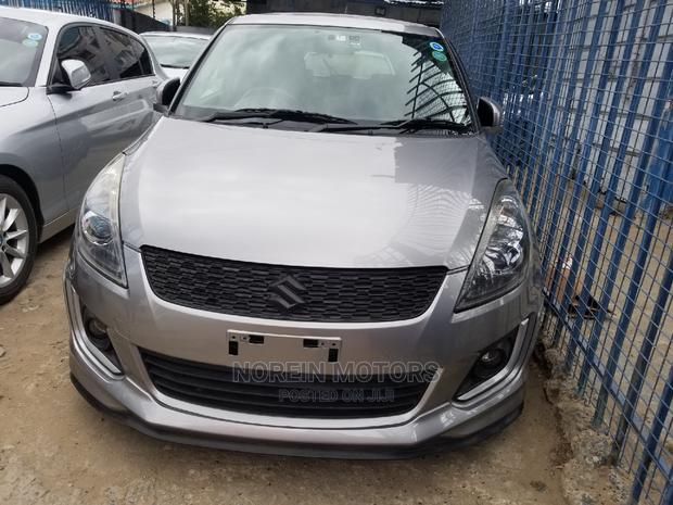 Silver 2014 Suzuki Swift - Compact Car Excellence