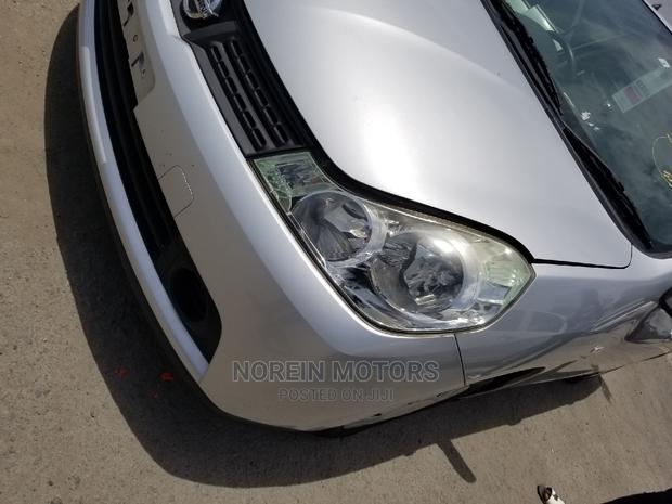 2014 Nissan Wingroad Silver - Spacious and Stylish Minivan for Sale