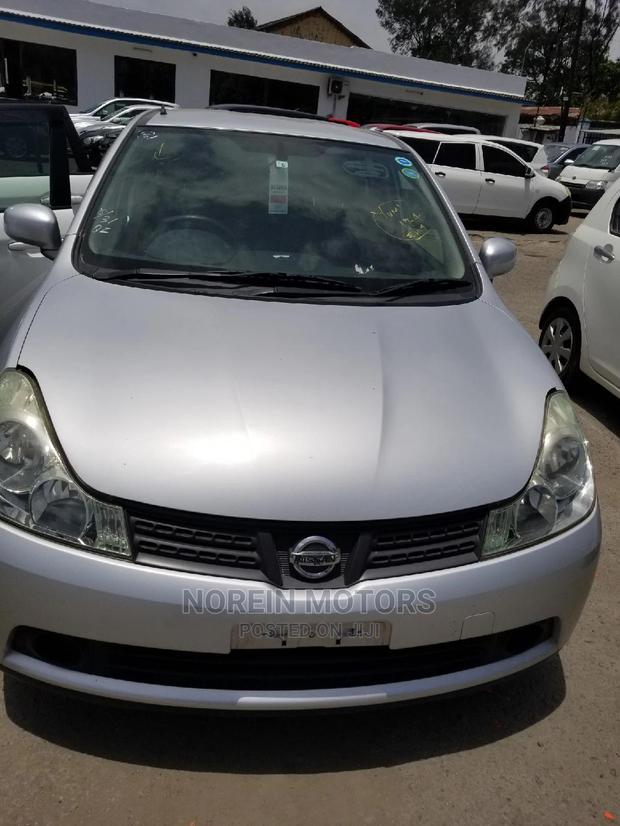 2014 Nissan Wingroad Silver - Spacious and Stylish Minivan for Sale