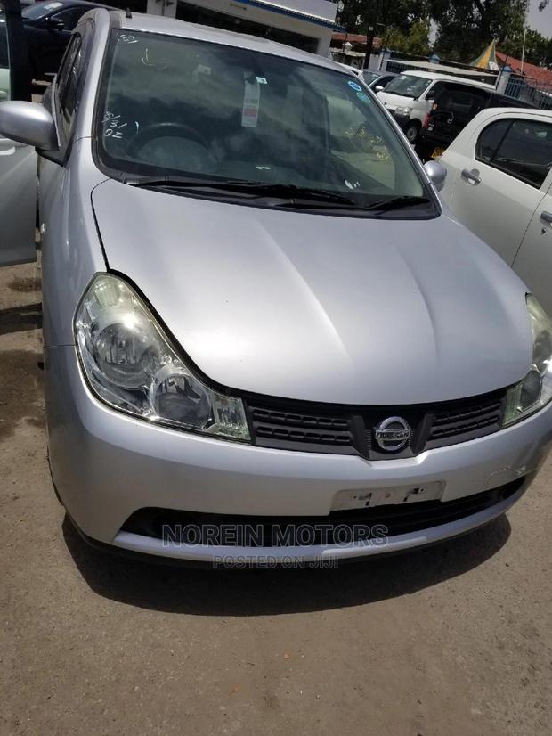 2014 Nissan Wingroad Silver - Spacious and Stylish Minivan for Sale