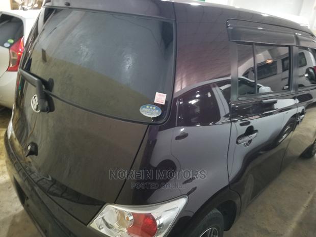 Purple Toyota bB 2014 - Compact Car Packed with Personality
