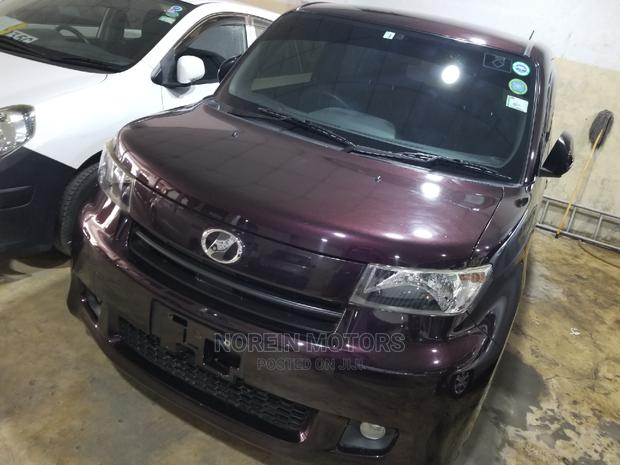 Purple Toyota bB 2014 - Compact Car Packed with Personality