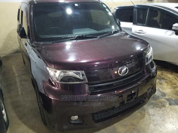 Purple Toyota bB 2014 - Compact Car Packed with Personality