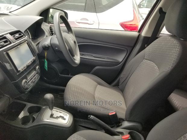 Pink Mitsubishi Mirage 2015: Affordable Compact Car