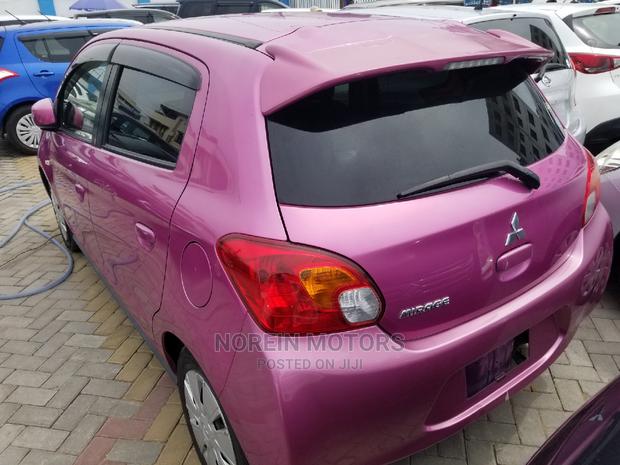 Pink Mitsubishi Mirage 2015: Affordable Compact Car