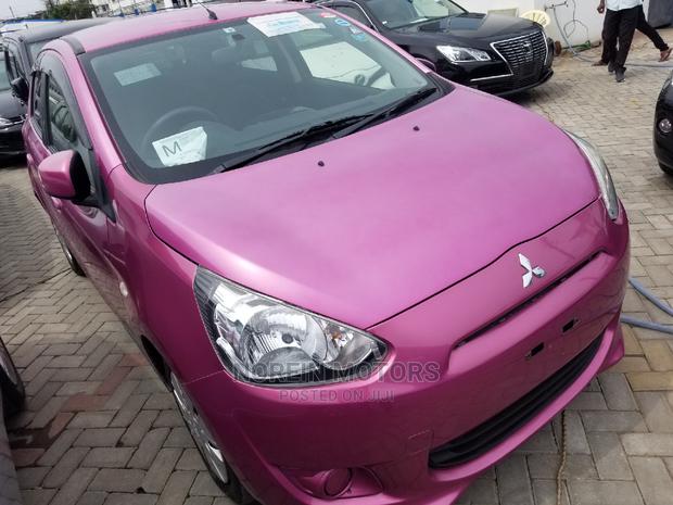 Pink Mitsubishi Mirage 2015: Affordable Compact Car