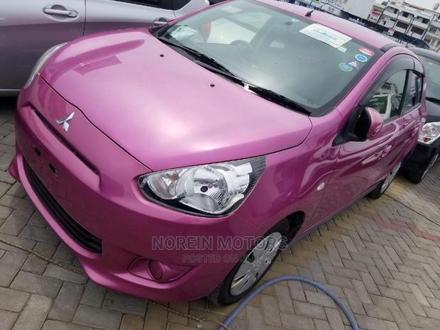 Pink Mitsubishi Mirage 2015: Affordable Compact Car
