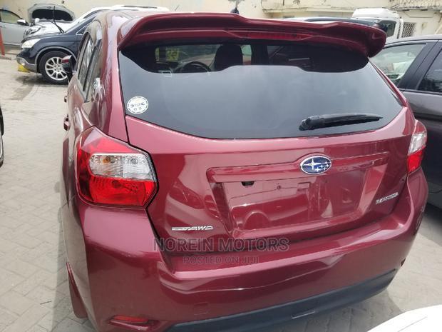 2014 Subaru Impreza in Red - Compact Sedan for Adventure